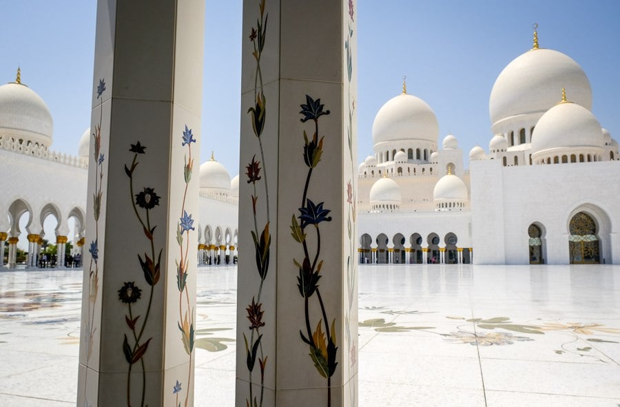 Artistic pillars and domes at the Sheikh Zayed Grand Mosque in Abu Dhabi, UAE