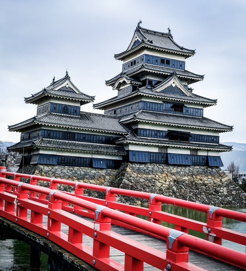 Red bridge at Matsumoto Castle in Japan