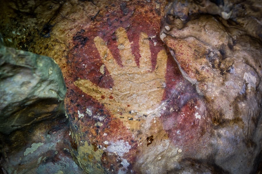 Prehistoric cave art hand print in Rammang Rammang Maros