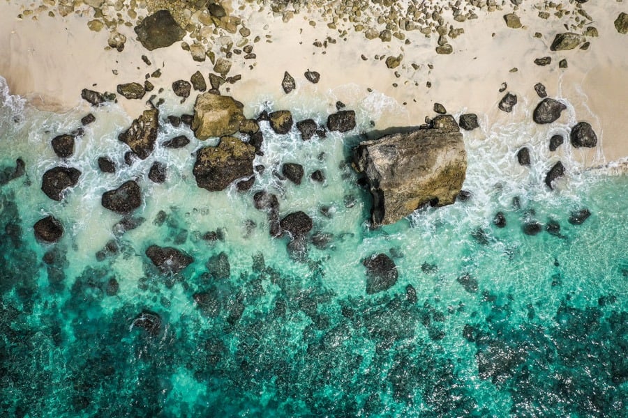 Beach waves rocks drone