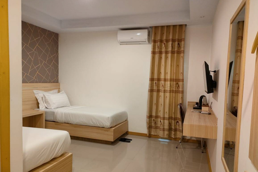Hotel room at Wisma Sidapore Teluk Bayur in Salakan Banggai